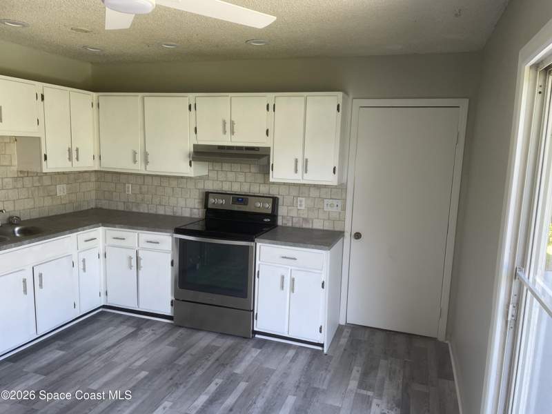 4 bedroom Single Family Residence at 3611 Jupiter Boulevard, Port Malabar Unit 9, Palm Bay — photo 5