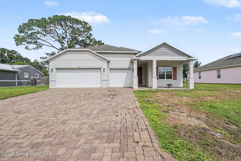 4 bedroom Single Family Residence at 1030 Grapefruit Road, Port Malabar Unit 11, Palm Bay — photo 1