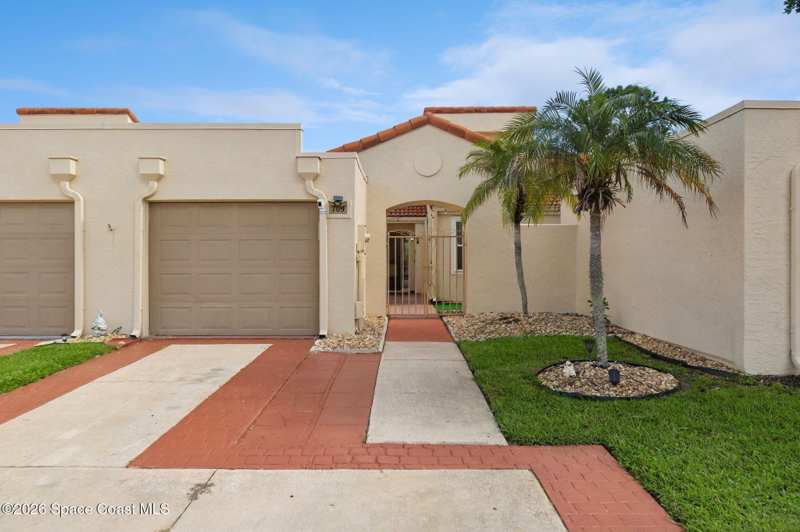 2 bedroom Townhouse at 709 Spring Valley Drive, Courtyards Suntree Pud Stage 5, Melbourne — photo 1
