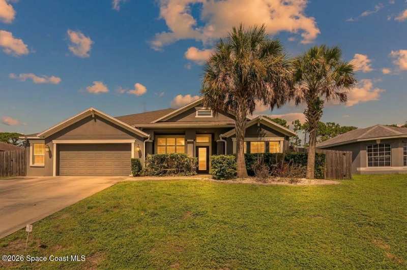 5 bedroom Single Family Residence at 335 Evergreen Street, Port Malabar Unit 7, Palm Bay — photo 1
