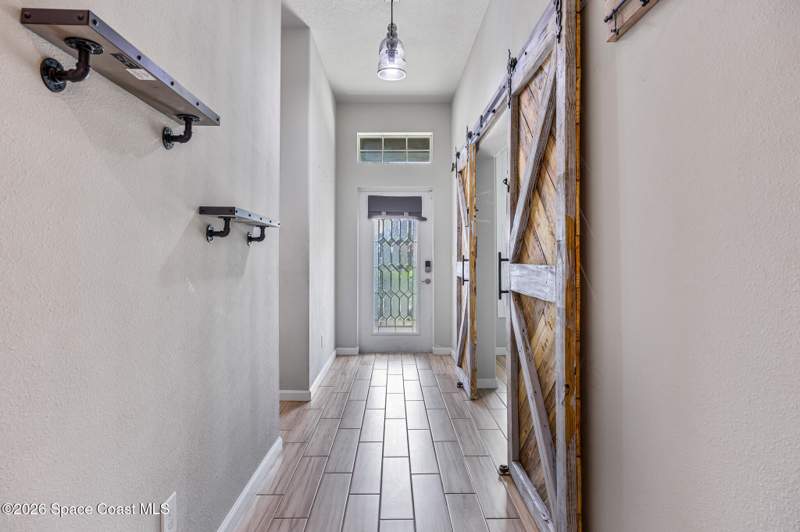 5 bedroom Single Family Residence at 335 Evergreen Street, Port Malabar Unit 7, Palm Bay — photo 2