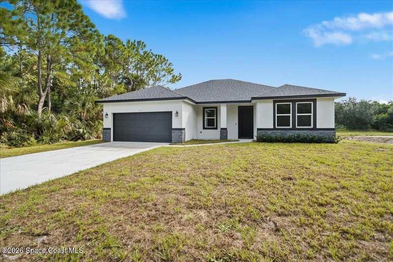 4 bedroom Single Family Residence at 3373 Fitzpatrick Avenue, Port Malabar Unit 30, Palm Bay — photo 1