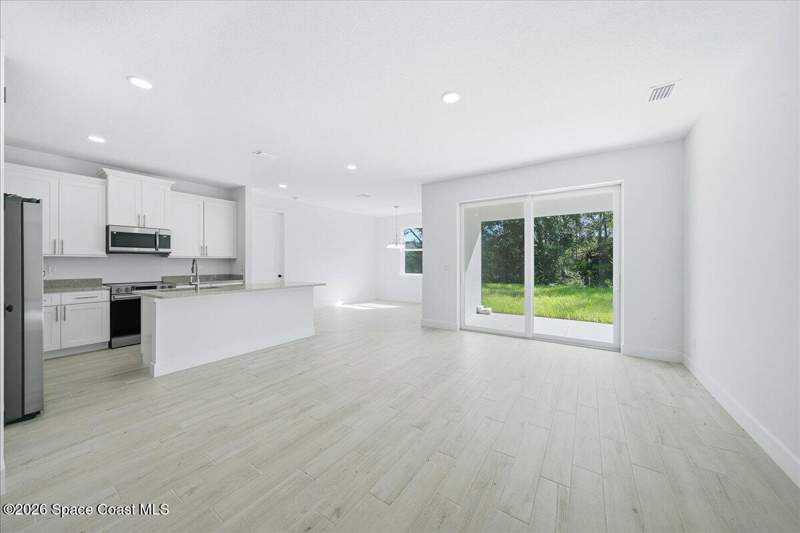 4 bedroom Single Family Residence at 3125 Westover Avenue, Port Malabar Unit 24, Palm Bay — photo 4