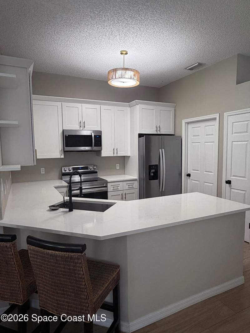 4 bedroom Single Family Residence at 2491 Stratford Pointe Drive, Stratford Pointe Phase 4, West Melbourne — photo 4