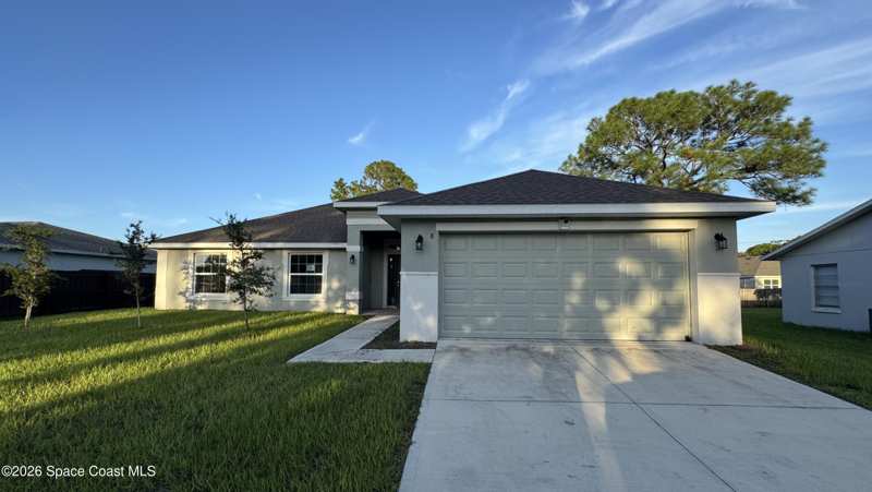 4 bedroom Single Family Residence at 883 Charcoal Avenue, Port Malabar Unit 11, Palm Bay — photo 1