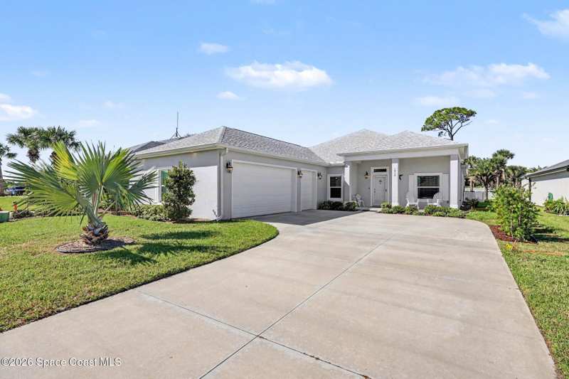 4 bedroom Single Family Residence at 1912 Freedom Drive, Tract H at Indian River Colony Club, Melbourne — photo 1