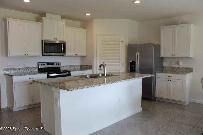4 bedroom Single Family Residence at 3747 Aberdeen Drive, Cypress Bay Preserve Phase 1, Palm Bay — photo 3