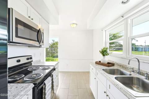 1054 Daytona Drive, Palm Bay FL - photo 7 of 35