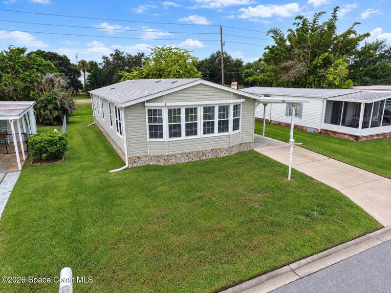 2 bedroom Manufactured Home at 923 Vireo Drive, Barefoot Bay Unit 2 Part 13, Barefoot Bay — photo 2