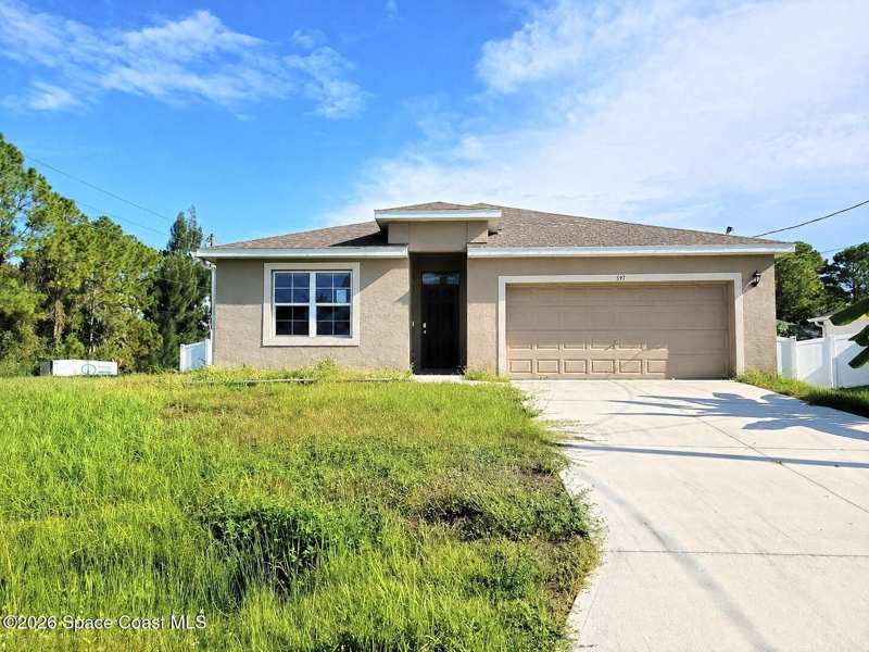 4 bedroom Single Family Residence at 597 J T Sancho Street, Port Malabar Unit 31, Palm Bay — photo 1