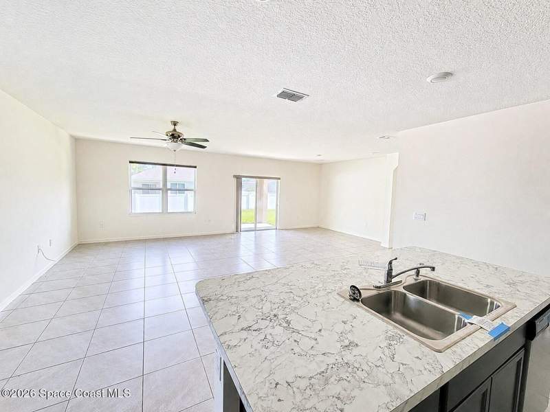 4 bedroom Single Family Residence at 597 J T Sancho Street, Port Malabar Unit 31, Palm Bay — photo 3