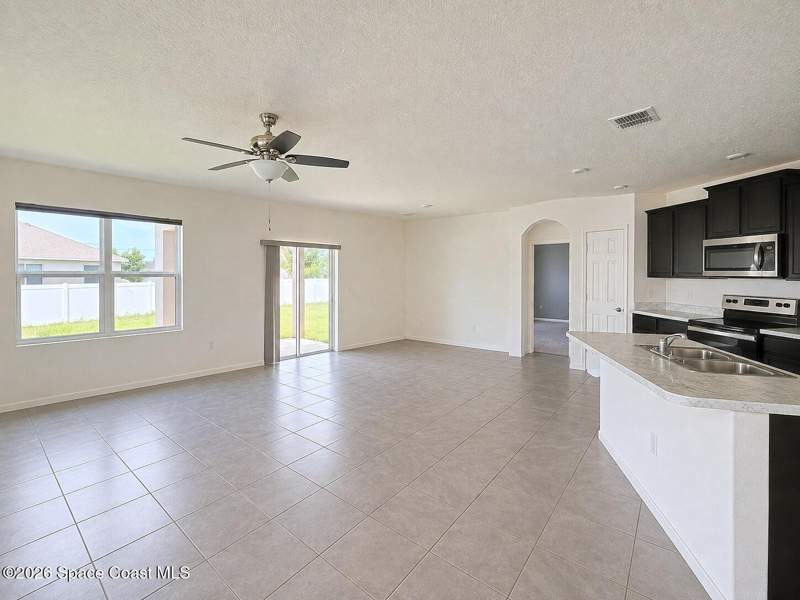 4 bedroom Single Family Residence at 597 J T Sancho Street, Port Malabar Unit 31, Palm Bay — photo 4