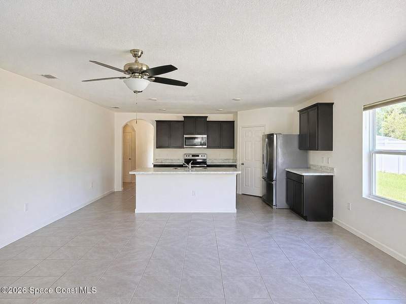 4 bedroom Single Family Residence at 597 J T Sancho Street, Port Malabar Unit 31, Palm Bay — photo 5
