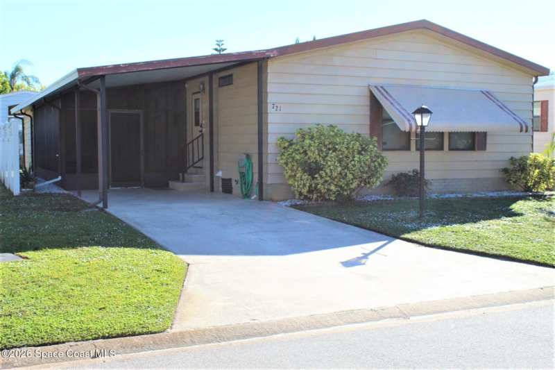 2 bedroom Manufactured Home at 721 Oleander Circle, Barefoot Bay Unit 2 Part 10, Micco — photo 1