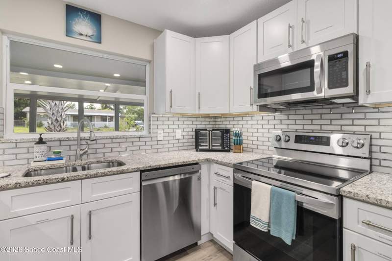 5 bedroom Single Family Residence at 4425 Stuart Avenue, Indian River Heights Unit 1, Titusville — photo 4