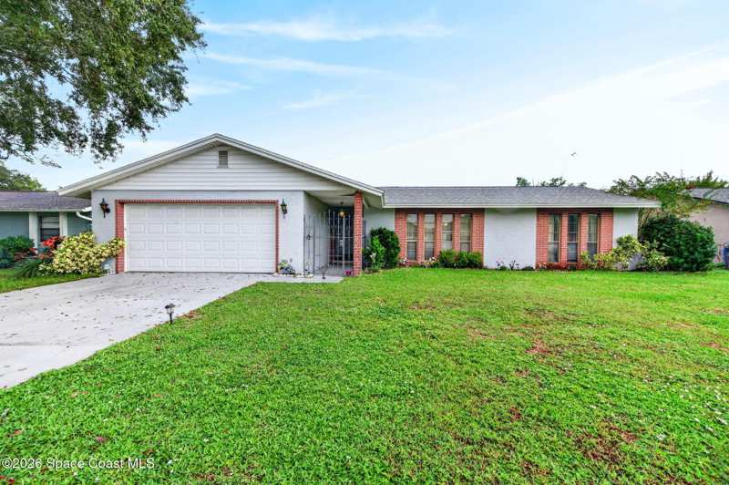 4 bedroom Single Family Residence at 541 Charlotta Avenue, Port Malabar Unit 9, Palm Bay — photo 1