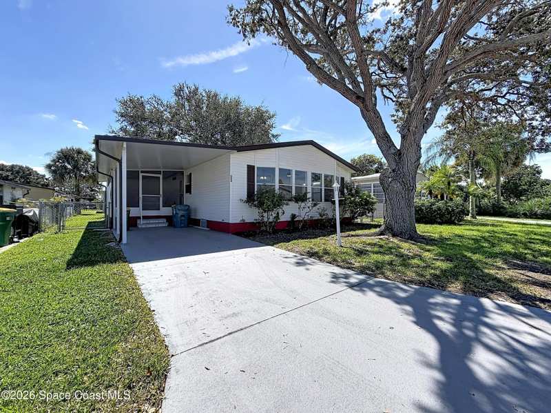 2 bedroom Manufactured Home at 553 N Marlin Circle, Barefoot Bay Unit 1, Barefoot Bay — photo 1