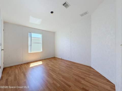 646 Periwinkle Circle, Barefoot Bay FL - photo 12 of 16