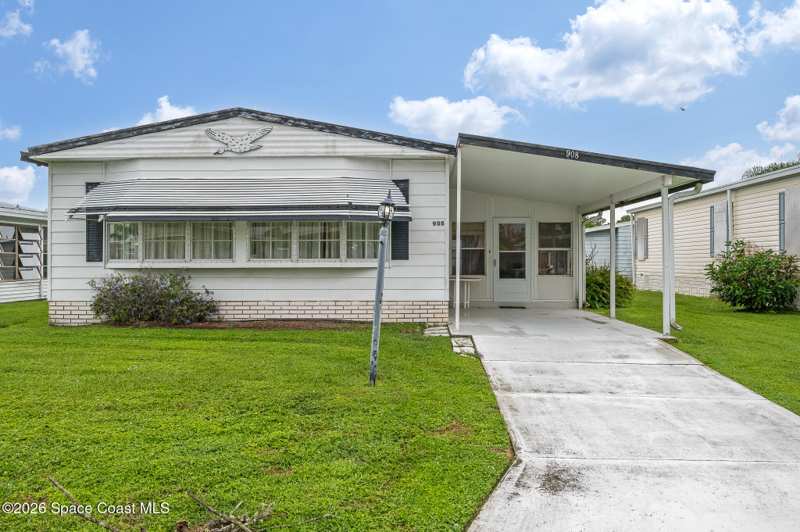 2 bedroom Manufactured Home at 908 Thrush Circle, Barefoot Bay Unit 2 Part 10, Barefoot Bay — photo 1