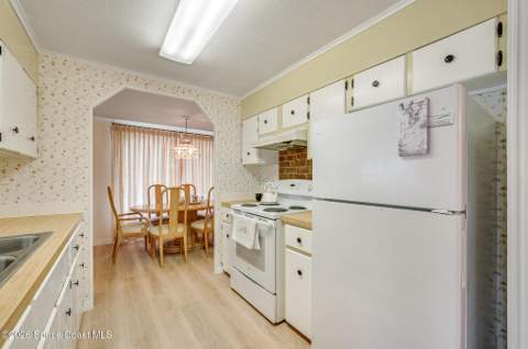 908 Thrush Circle, Barefoot Bay FL - photo 10 of 45