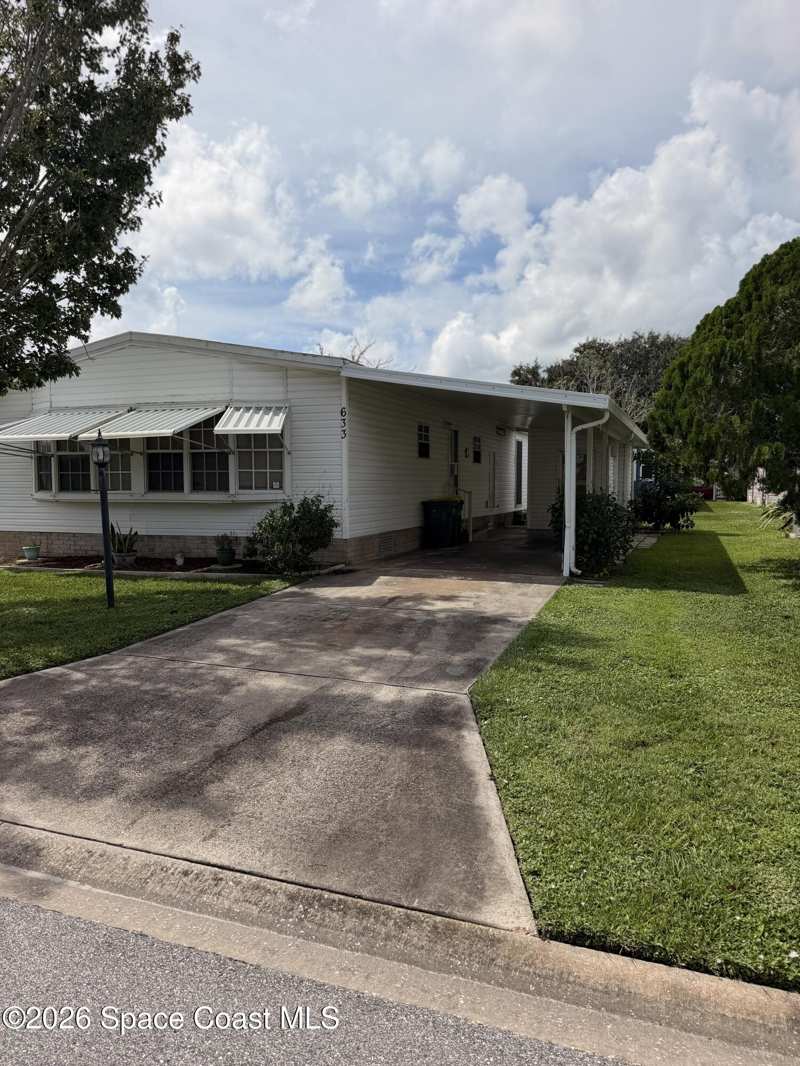 2 bedroom Single Family Residence at 633 Amaryllis Drive, Barefoot Bay Unit 2 Part 10 Replat of Park Areas, Barefoot Bay — photo 1