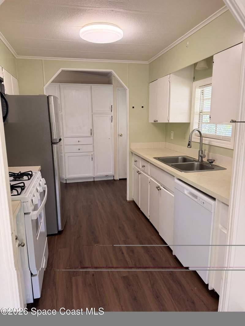 2 bedroom Single Family Residence at 633 Amaryllis Drive, Barefoot Bay Unit 2 Part 10 Replat of Park Areas, Barefoot Bay — photo 4