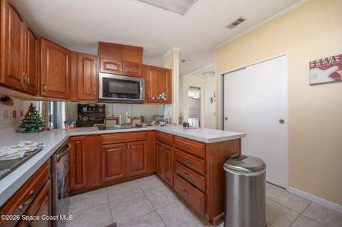 604 Amaryllis Drive, Barefoot Bay FL - photo 18 of 31