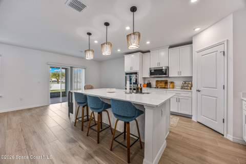 6345 Moonrise Drive, Merritt Island FL - photo 11 of 57