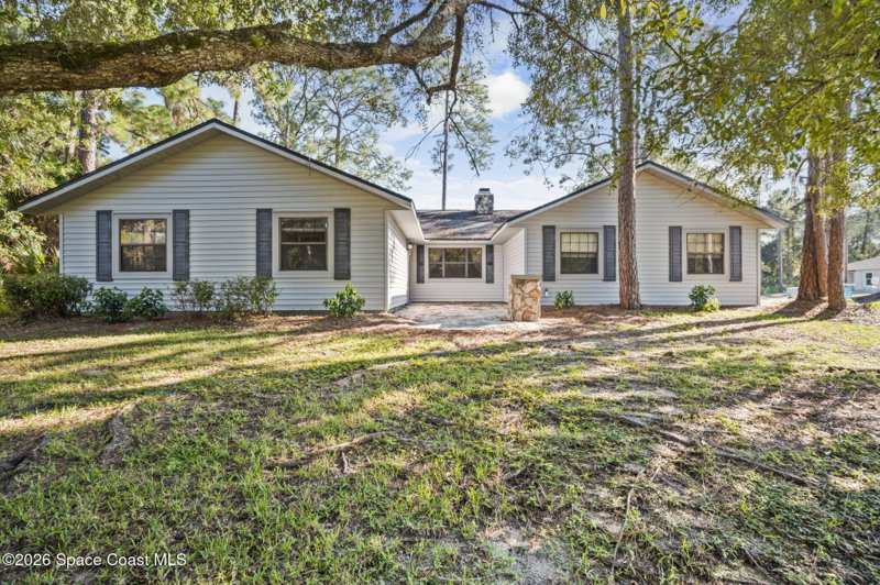 4 bedroom Single Family Residence at 896 Angelico Road, Port Malabar Unit 14, Palm Bay — photo 1