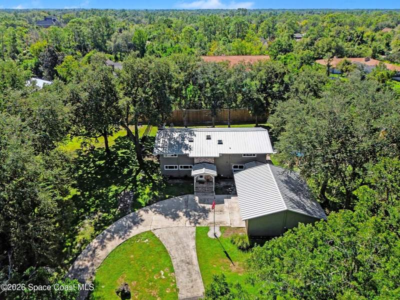 4 bedroom Single Family Residence at 3855 Lost Tree Court, Hidden Hills, Titusville — photo 4