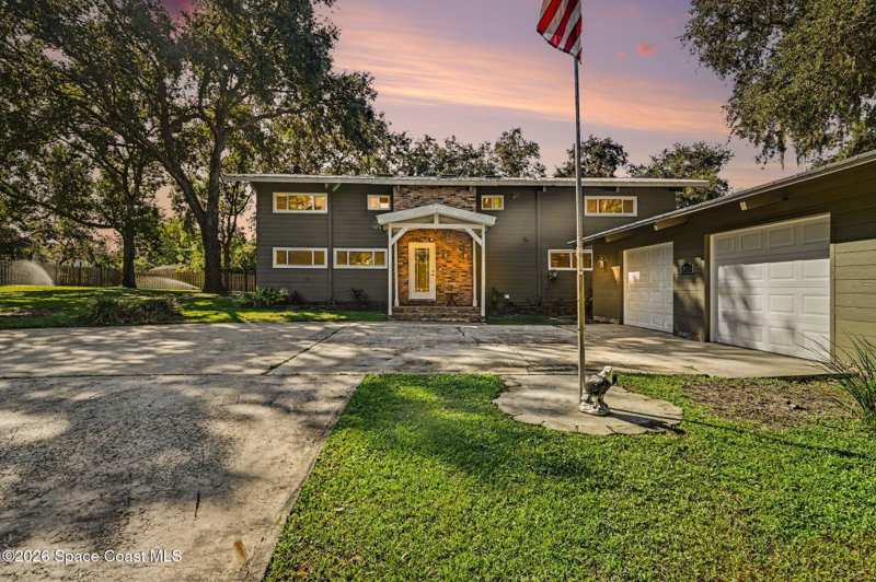 4 bedroom Single Family Residence at 3855 Lost Tree Court, Hidden Hills, Titusville — photo 1