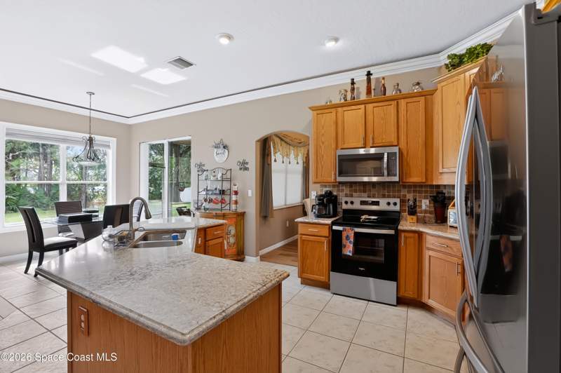 4 bedroom Single Family Residence at 2061 Thornwood Drive, Magnolia Park at Bayside Lakes, Palm Bay — photo 2