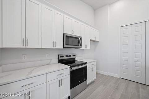 1328 Tilberg Avenue, Palm Bay FL - photo 9 of 28
