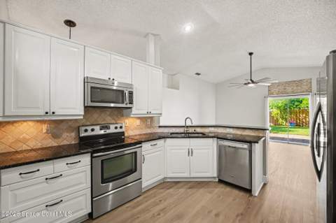 7064 Red Bay Court, Melbourne FL - photo 7 of 29