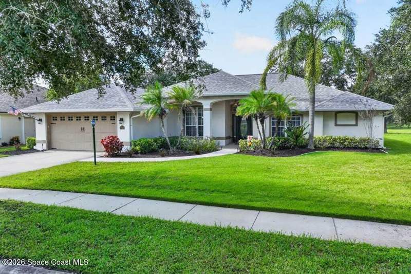 4 bedroom Single Family Residence at 941 SE Gardenbrook Court, Summerfield at Bayside Lakes Phase 1, Palm Bay — photo 4