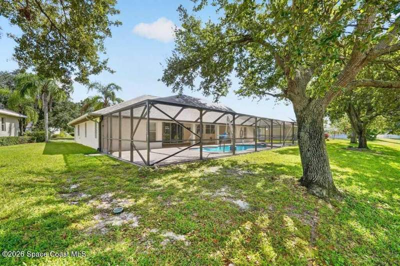 4 bedroom Single Family Residence at 941 SE Gardenbrook Court, Summerfield at Bayside Lakes Phase 1, Palm Bay — photo 5