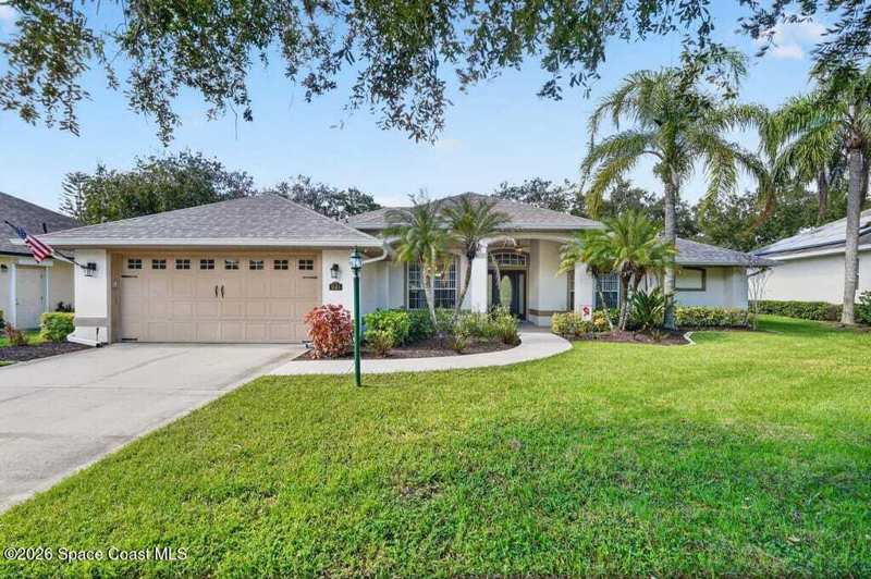 4 bedroom Single Family Residence at 941 SE Gardenbrook Court, Summerfield at Bayside Lakes Phase 1, Palm Bay — photo 1