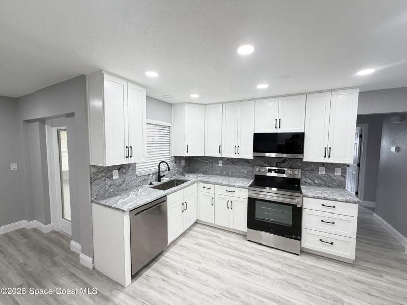 4 bedroom Single Family Residence at 4461 Longbow Drive, Sherwood Estates Unit 8, Titusville — photo 2