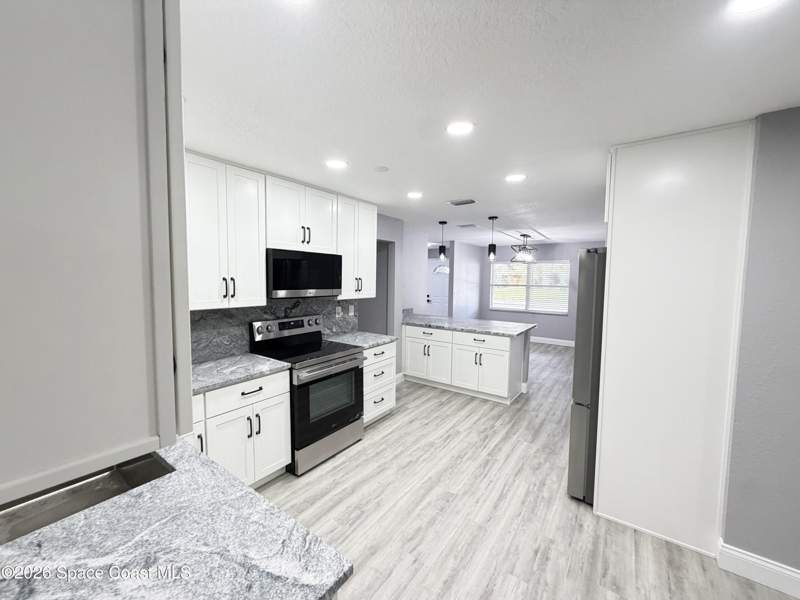4 bedroom Single Family Residence at 4461 Longbow Drive, Sherwood Estates Unit 8, Titusville — photo 3
