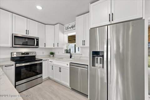 446 Coral Drive, Melbourne FL - photo 8 of 44
