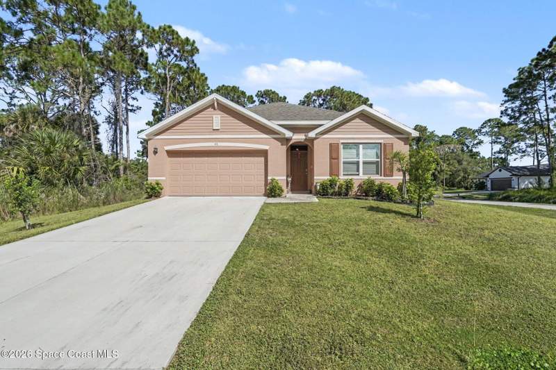 4 bedroom Single Family Residence at 431 Garbelmann Street, Port Malabar Unit 32, Palm Bay — photo 5