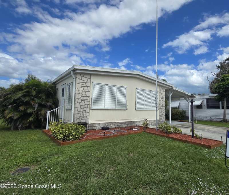 2 bedroom Manufactured Home at 861 Pecan Circle, Barefoot Bay Unit 2 Part 12, Barefoot Bay — photo 1