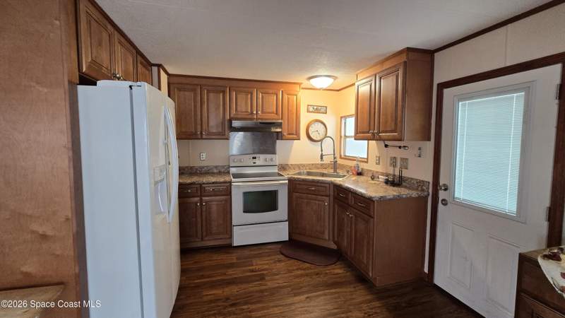 2 bedroom Manufactured Home at 861 Pecan Circle, Barefoot Bay Unit 2 Part 12, Barefoot Bay — photo 5