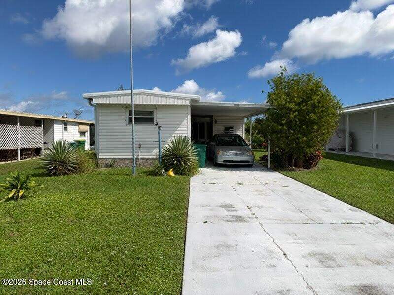 2 bedroom Manufactured Home at 720 Barefoot Boulevard, Barefoot Bay Unit 2 Part 11, Barefoot Bay — photo 2