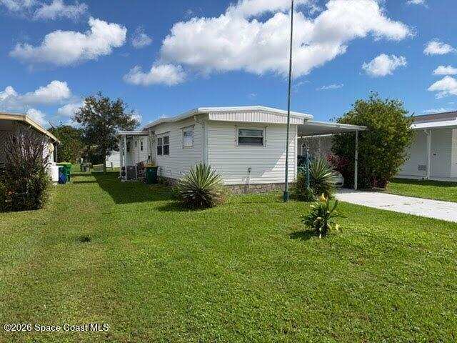 2 bedroom Manufactured Home at 720 Barefoot Boulevard, Barefoot Bay Unit 2 Part 11, Barefoot Bay — photo 1