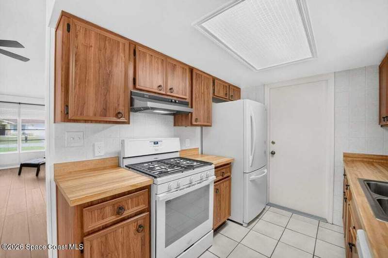 3 bedroom Single Family Residence at 3701 Militia Drive, American Village Pud Stage 3, Titusville — photo 3