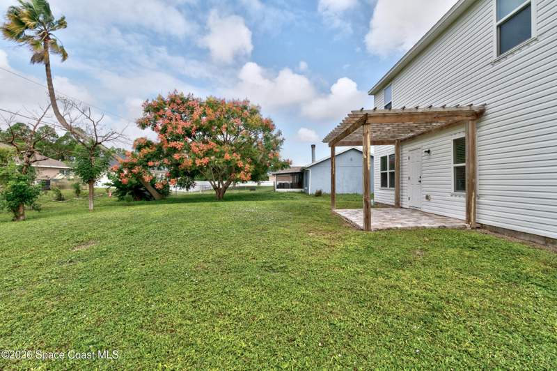4 bedroom Single Family Residence at 986 Aurelia Avenue, Port Malabar Unit 12, Palm Bay — photo 3