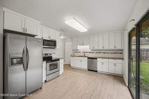 6975 Briggs Avenue, Cocoa FL - photo 8 of 26