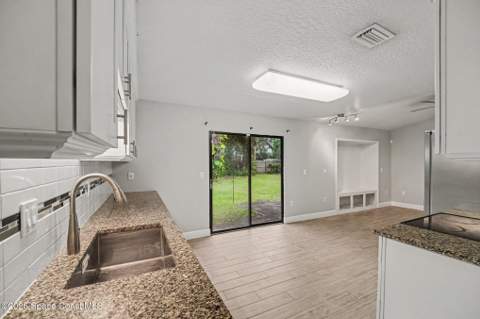 6975 Briggs Avenue, Cocoa FL - photo 10 of 26
