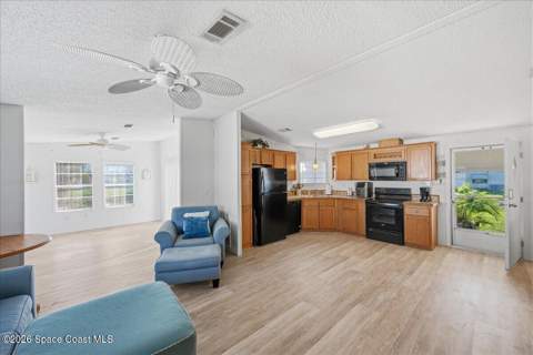1145 Wren Circle, Barefoot Bay FL - photo 11 of 34